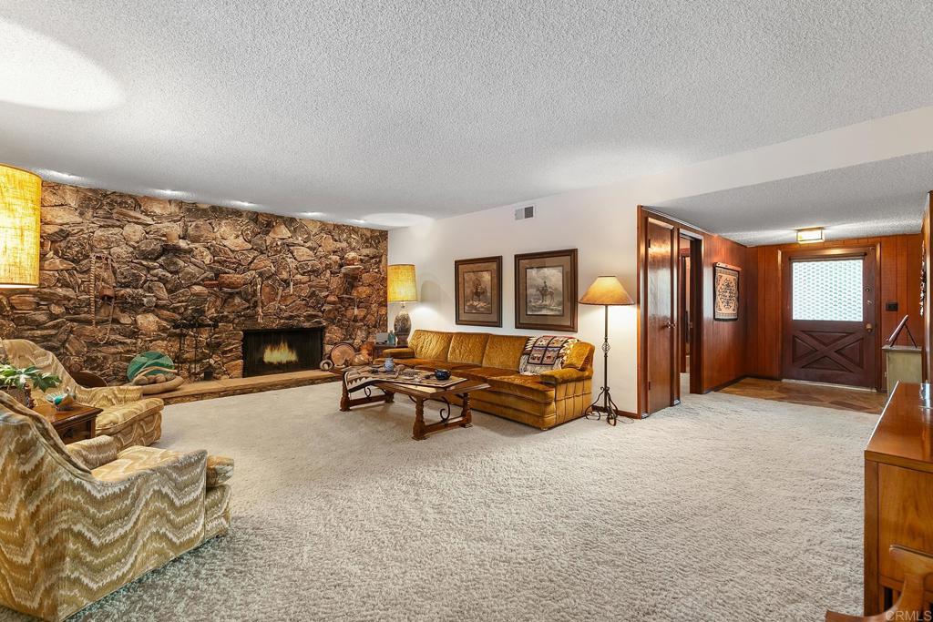 2686 Via Viejas Alpine, CA 91901 - Photo 7 of 64 a living room with furniture and a fireplace
