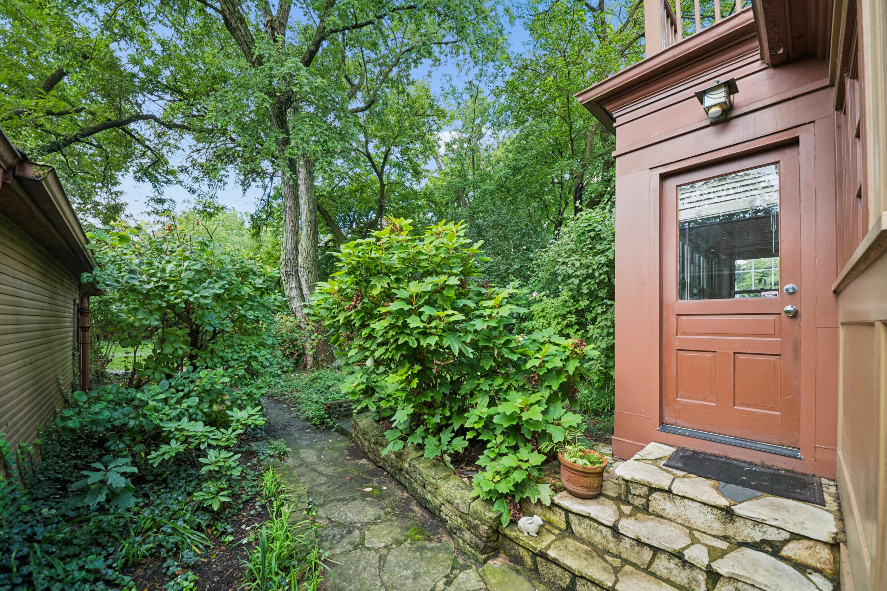 393 Mimring Road Columbus, OH 43202 - Photo 6 of 55 Back door to sunroom, path to large backyard-over a quarter acre!