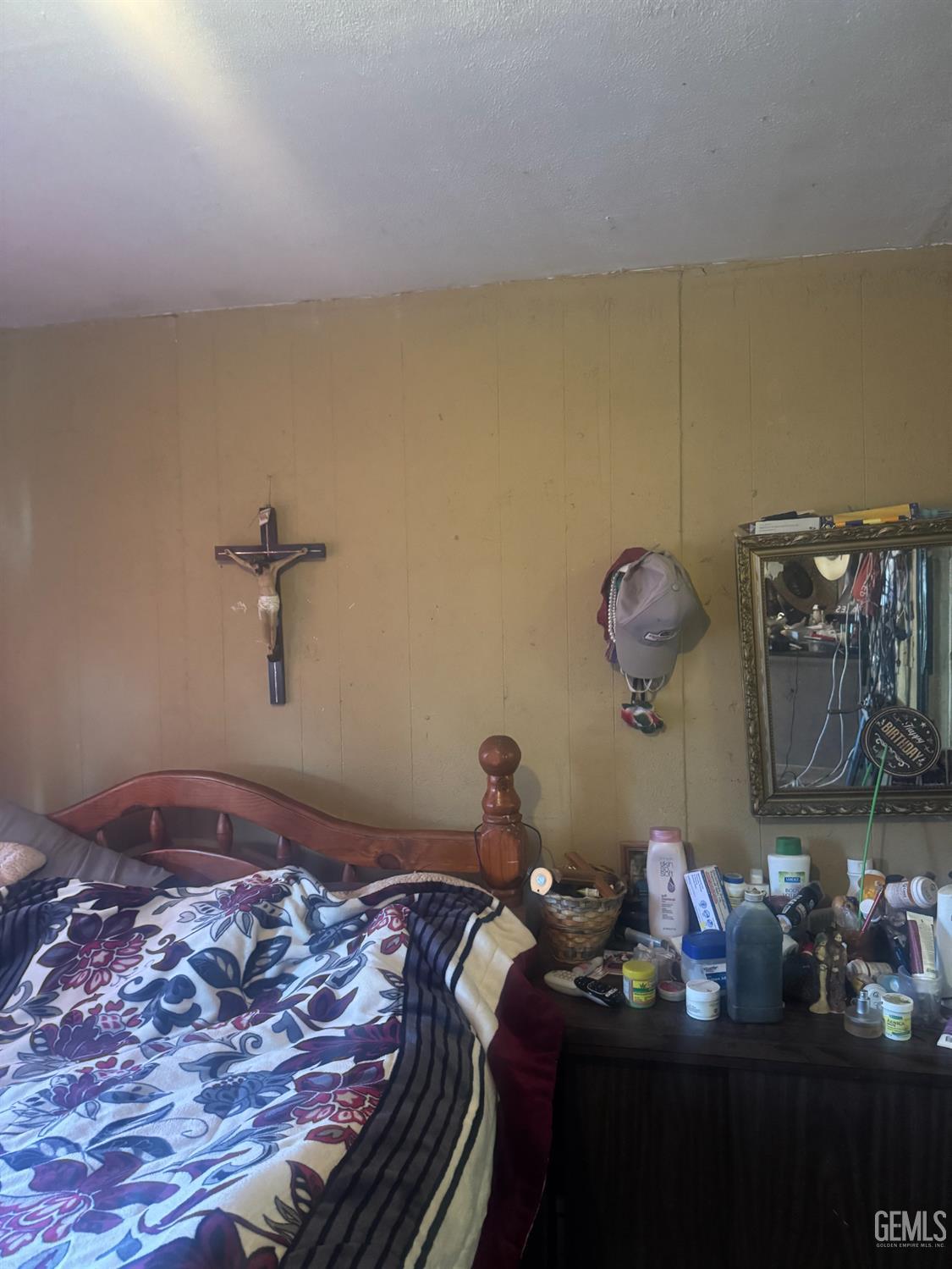 Undisclosed Address Buttonwillow, CA 93206 - Photo 12 of 19 a bedroom with a bed and dresser