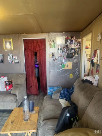 a bed room with a bed and a window