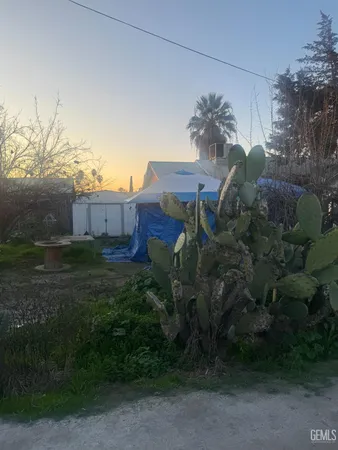 a view of a house with a garden