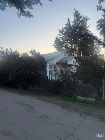 a view of a house with a street