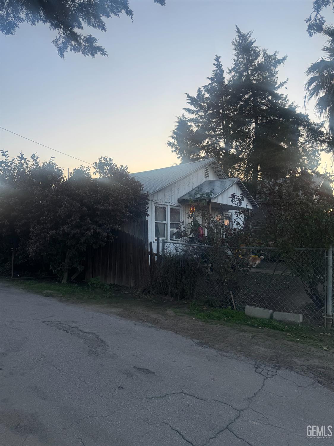 Undisclosed Address Buttonwillow, CA 93206 - Photo 4 of 19 a view of a house with a street