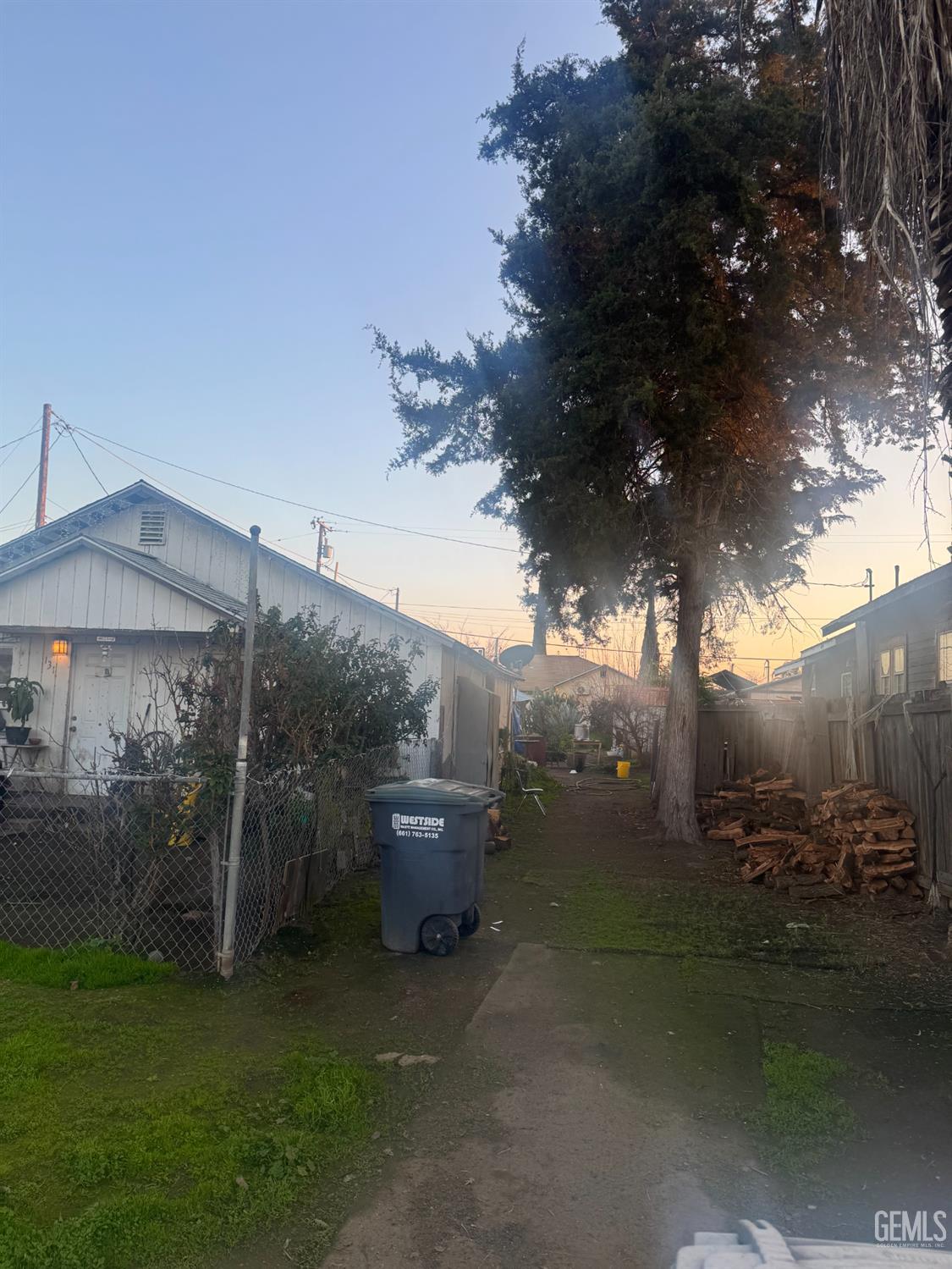 Undisclosed Address Buttonwillow, CA 93206 - Photo 6 of 19 a backyard of a house with lots of green space