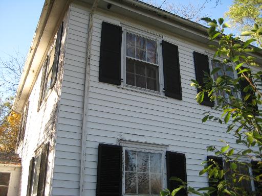 34W856 Country Club Road Wayne, IL 60184 - Photo 1 of 16 a view of a house with a door and wooden stairs