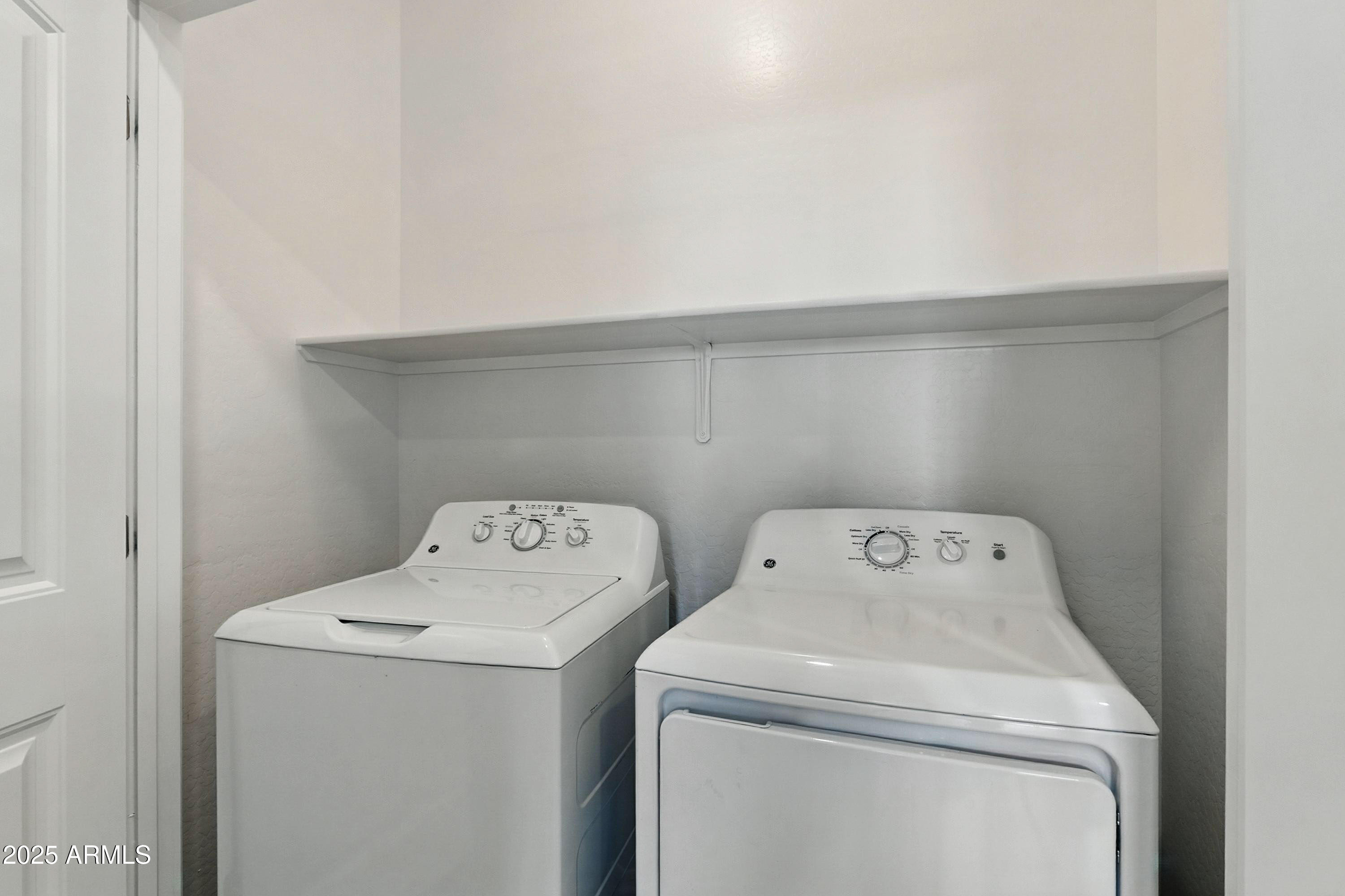 3330 South Gilbert Road, Unit 2062 Chandler, AZ 85286 - Photo 13 of 61 a utility room with dryer and washer