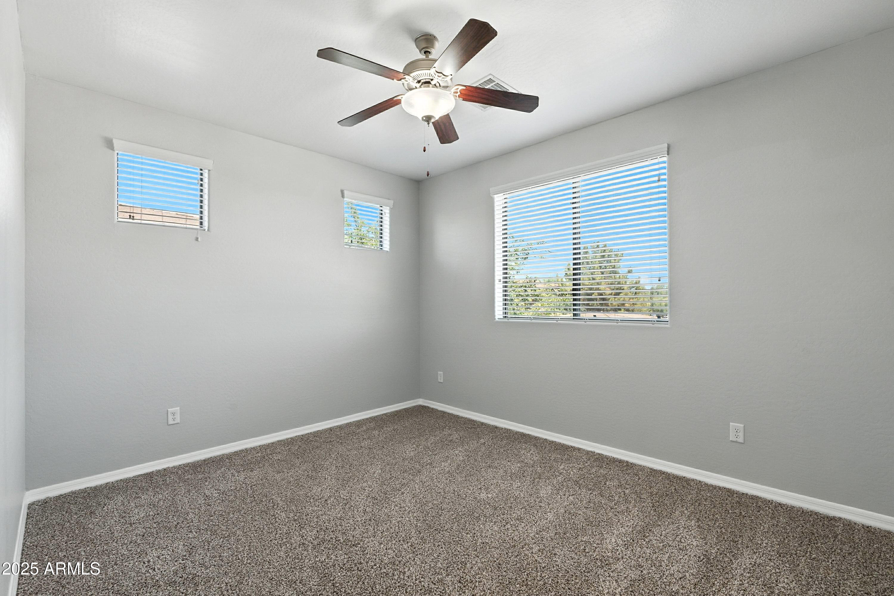 3330 South Gilbert Road, Unit 2062 Chandler, AZ 85286 - Photo 14 of 61 a view of an empty room with a window
