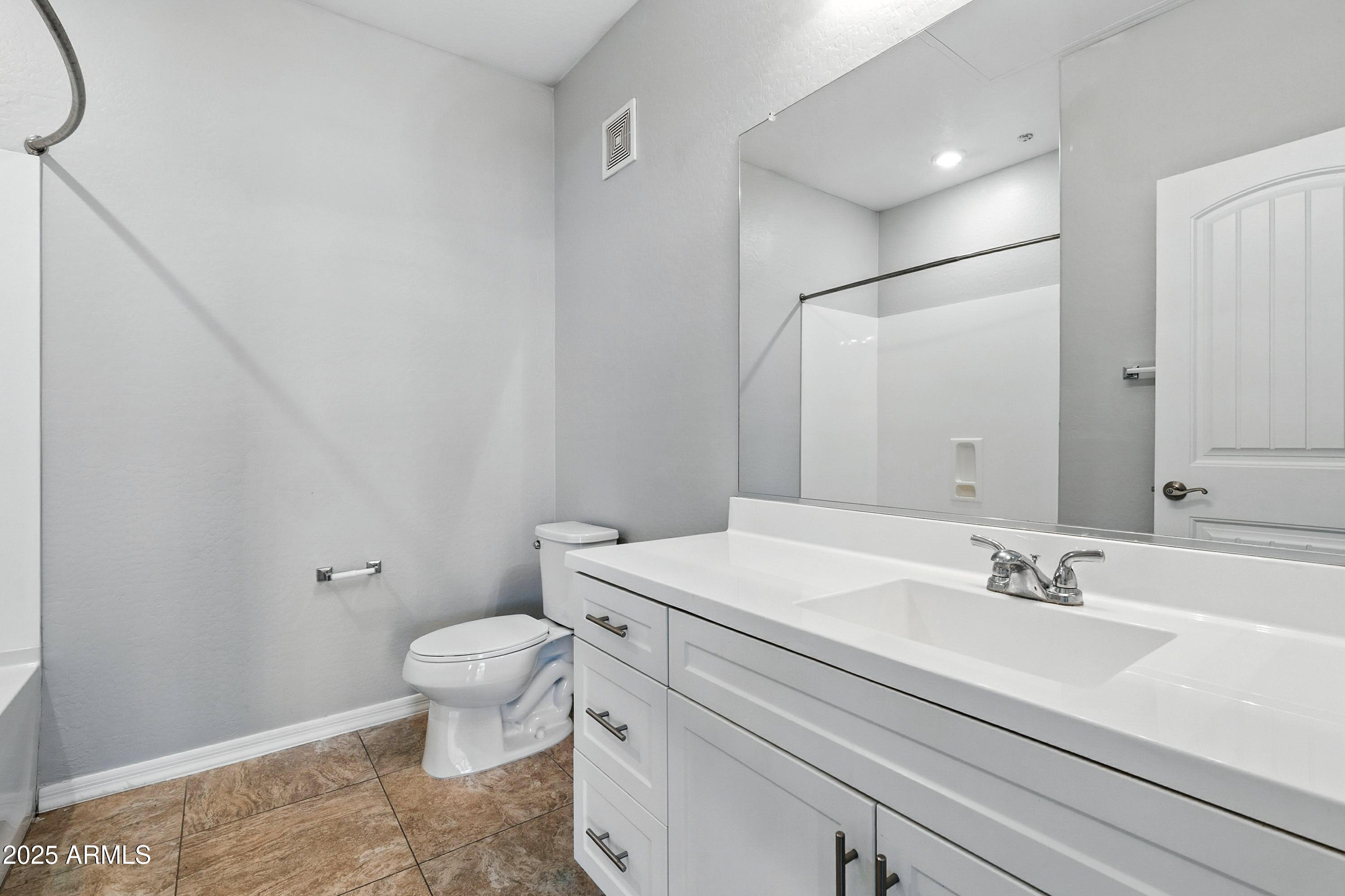 3330 South Gilbert Road, Unit 2062 Chandler, AZ 85286 - Photo 20 of 61 a bathroom with a sink a toilet and a mirror