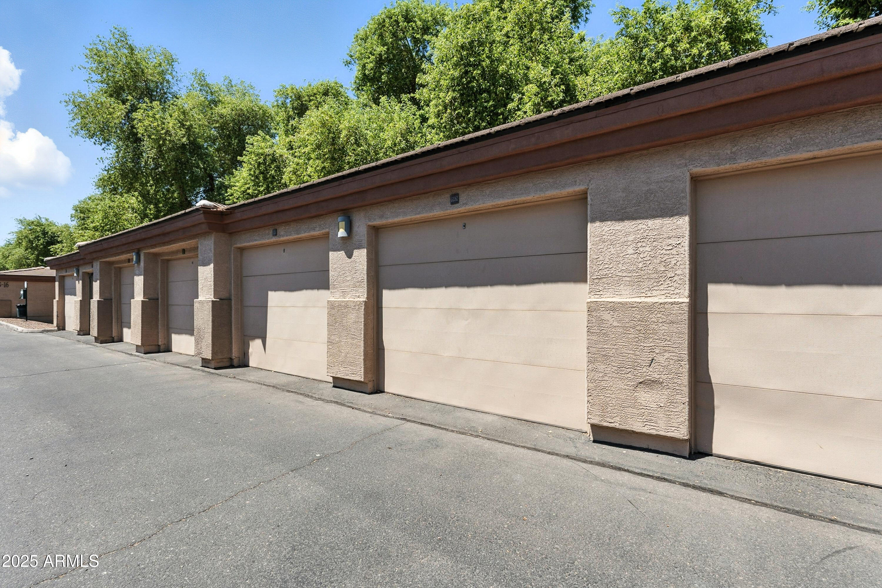 3330 South Gilbert Road, Unit 2062 Chandler, AZ 85286 - Photo 25 of 61 a view of a house with a garage