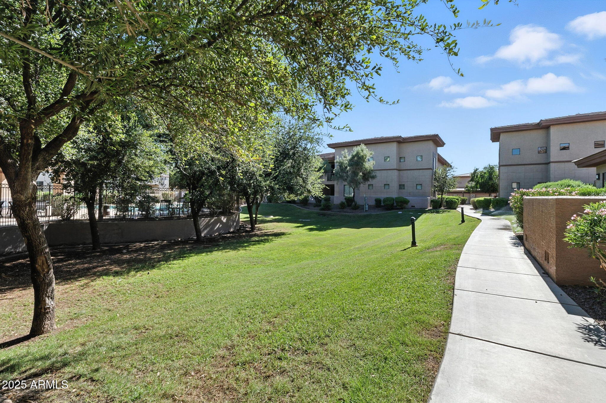 3330 South Gilbert Road, Unit 2062 Chandler, AZ 85286 - Photo 43 of 61 a view of a park with large trees