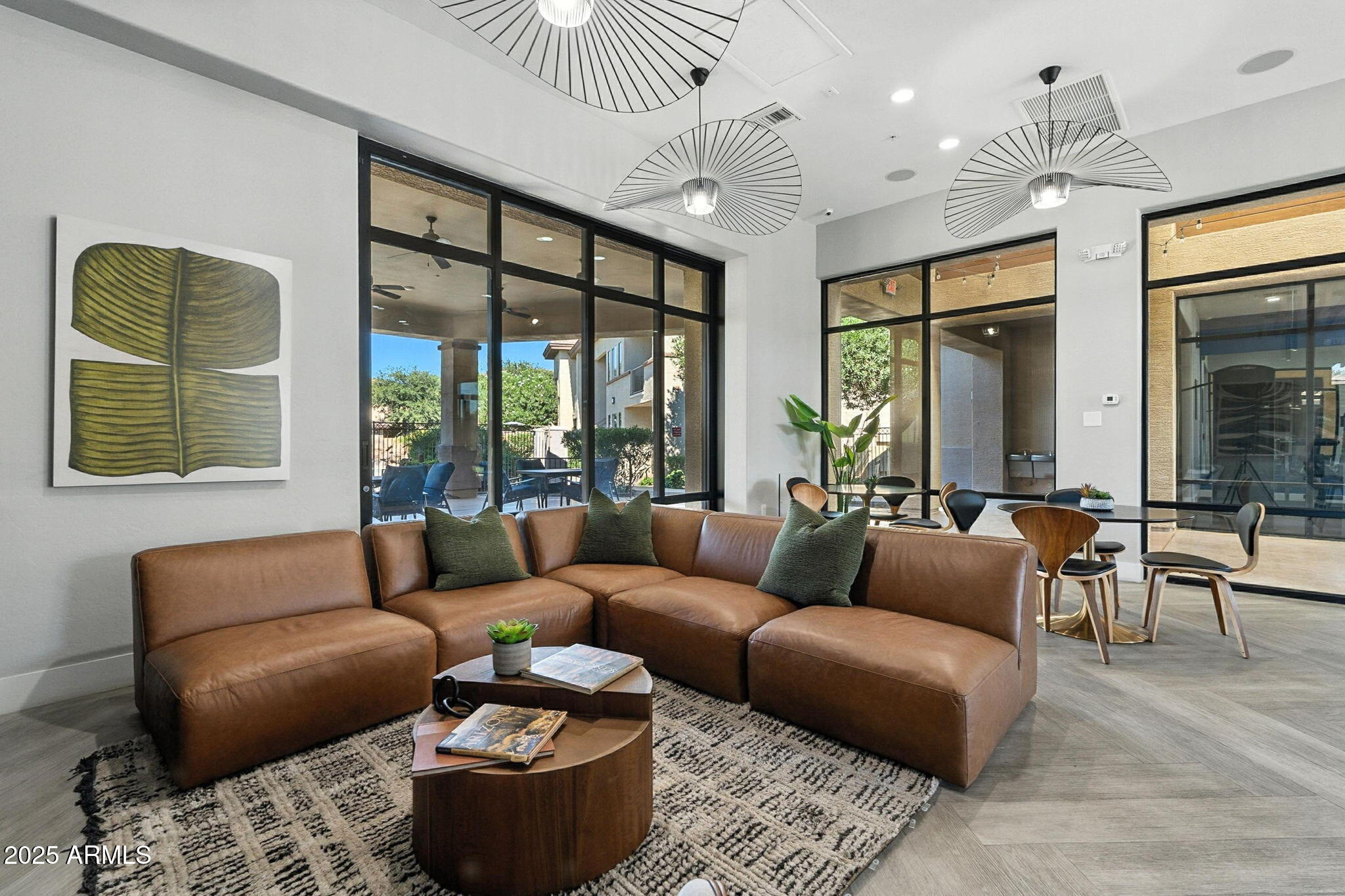 3330 South Gilbert Road, Unit 2062 Chandler, AZ 85286 - Photo 51 of 61 a living room with furniture and a large window