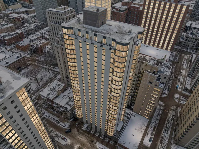 a bathroom with a glass door shower