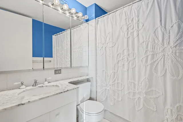 a view of a city with tall buildings