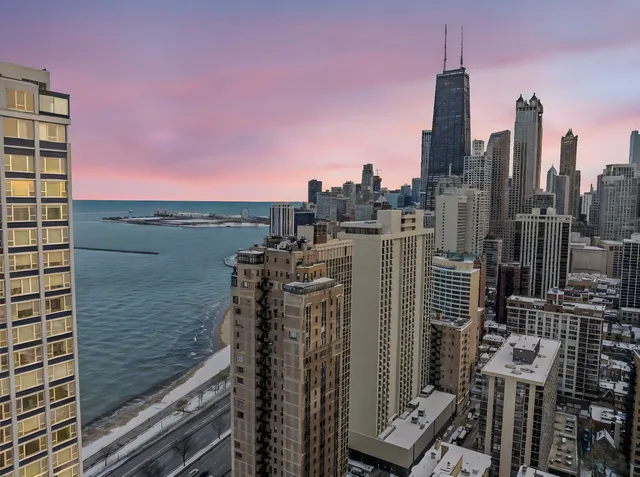 a view of a city with tall buildings