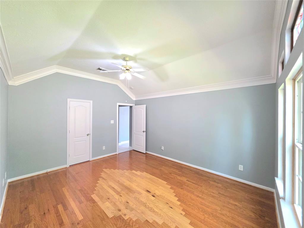 13618 Sablegrove Lane Houston, TX 77014 - Photo 14 of 30 an empty room with a natural light