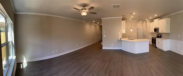 a large room with a lot of gym equipment