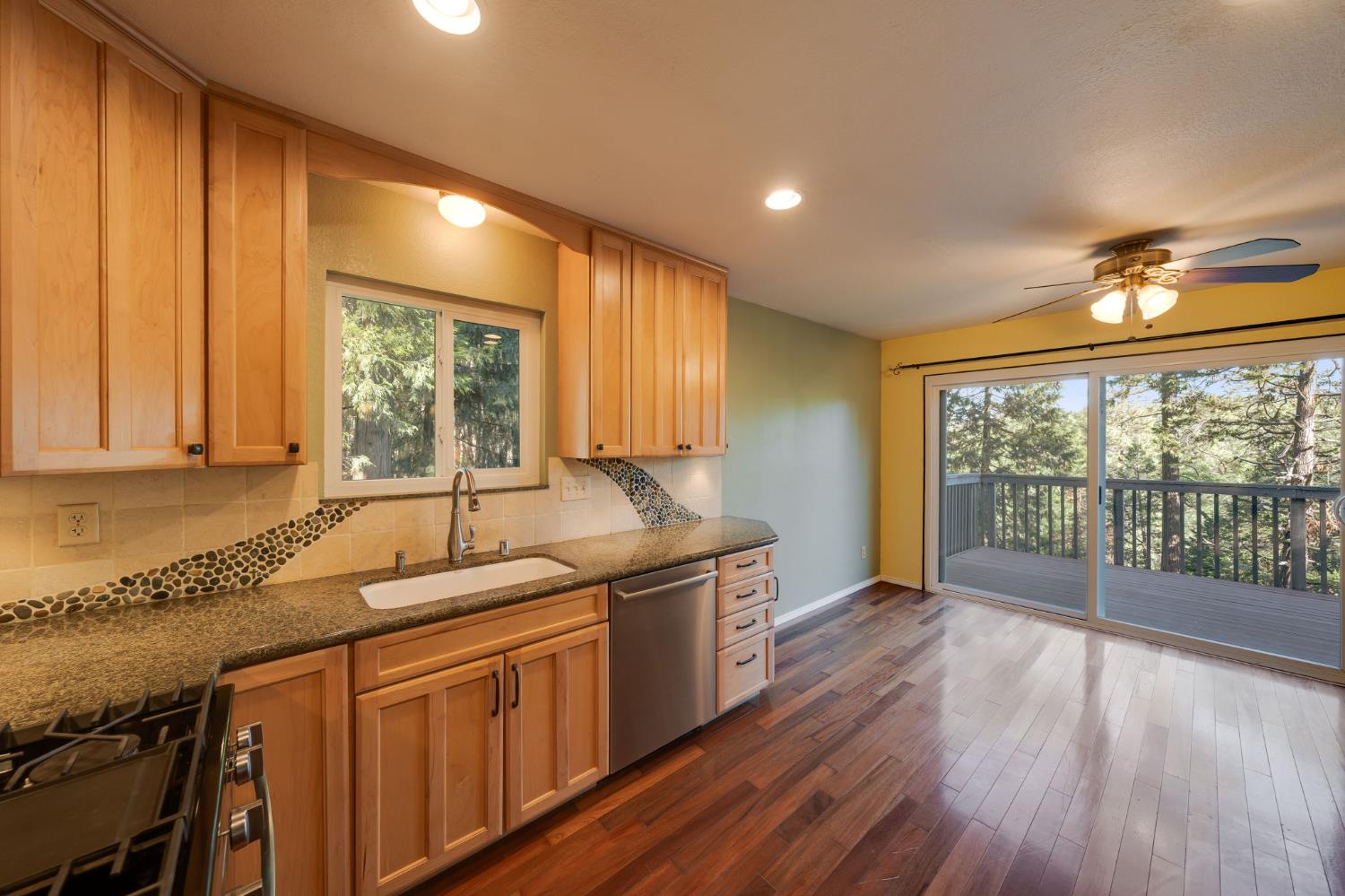 6139 Shad Way Pollock Pines, CA 95726 - Photo 12 of 49 a kitchen with a sink and large window
