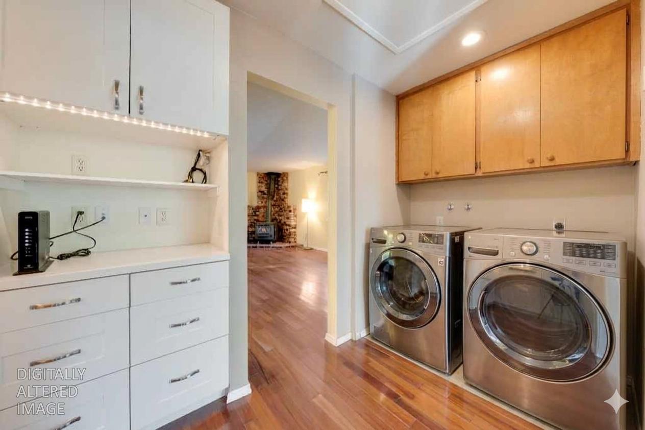6139 Shad Way Pollock Pines, CA 95726 - Photo 20 of 49 a view of a kitchen with cabinets and wooden floor