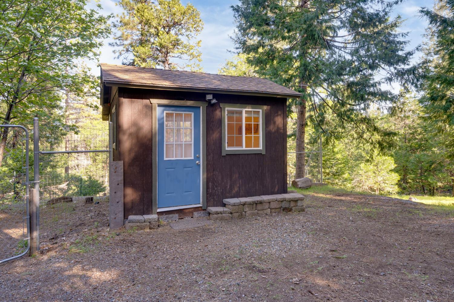 6139 Shad Way Pollock Pines, CA 95726 - Photo 37 of 49 a view of barn with large tree