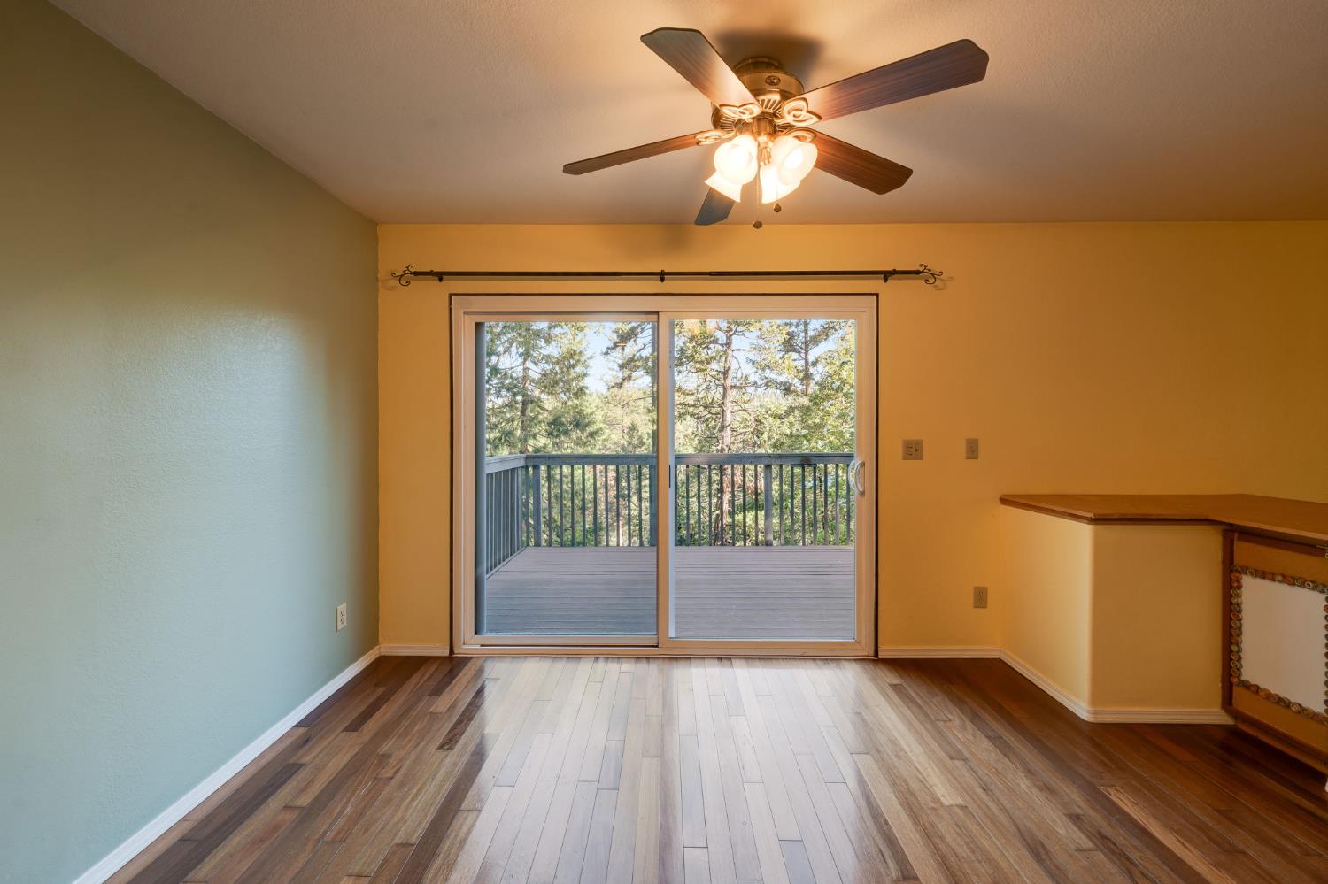 6139 Shad Way Pollock Pines, CA 95726 - Photo 8 of 49 wooden floor in an empty room with a window