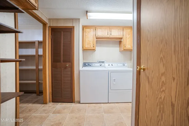 a white refrigerator freezer and a dishwasher in a kitchen