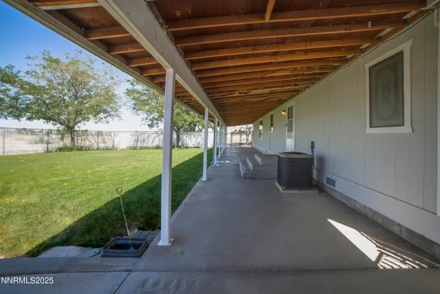 a view of a back yard of the house