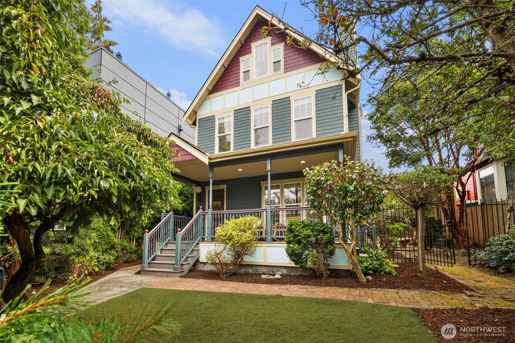 2446 Queen Anne Avenue North Seattle, WA 98109 - Photo 1 of 40 a front view of a house with a yard