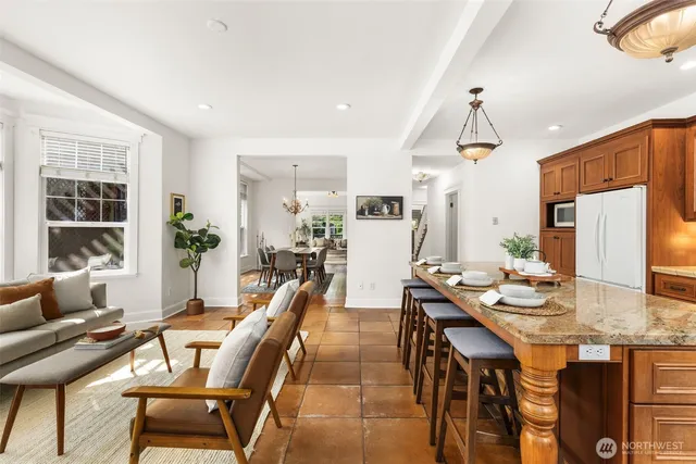 a dining room with furniture and window