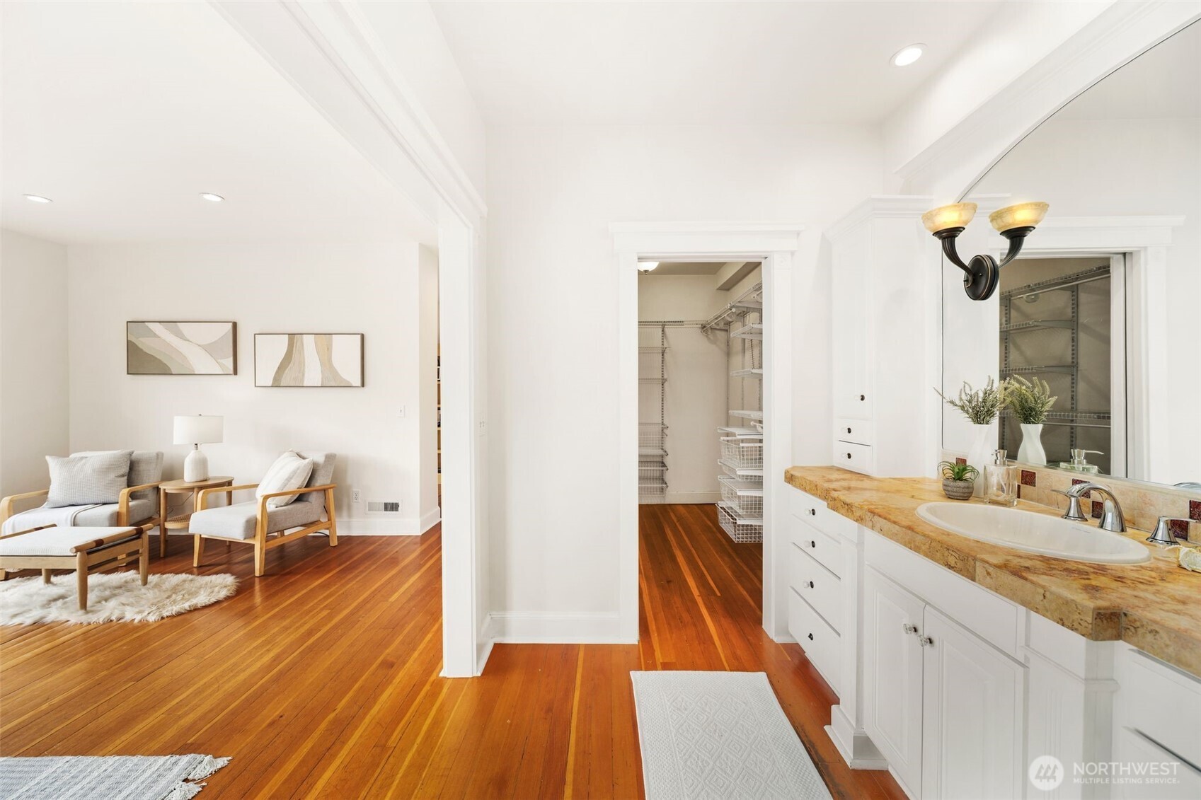 2446 Queen Anne Avenue North Seattle, WA 98109 - Photo 20 of 40 a spacious bathroom with a double vanity sink and a mirror