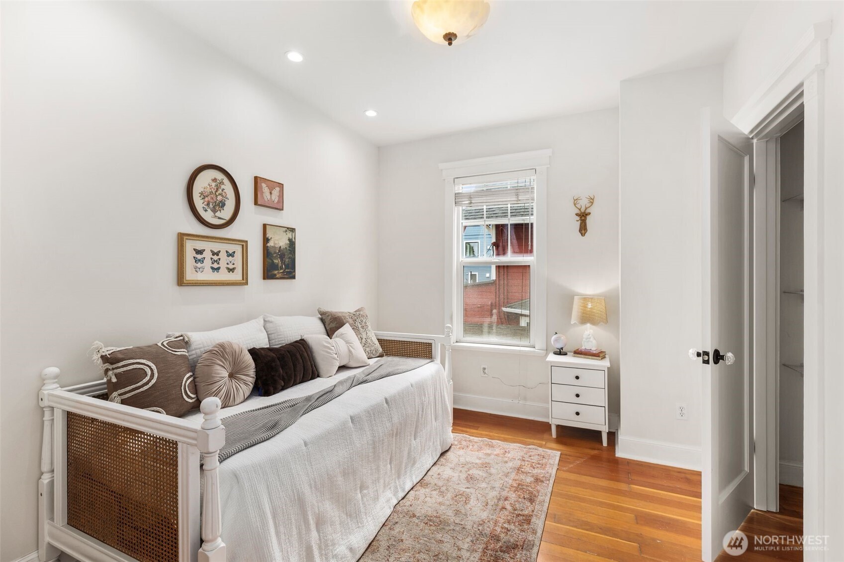 2446 Queen Anne Avenue North Seattle, WA 98109 - Photo 22 of 40 a living room with furniture and window