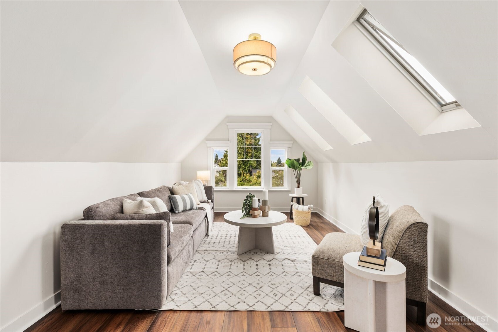 2446 Queen Anne Avenue North Seattle, WA 98109 - Photo 25 of 40 a living room with furniture and a window