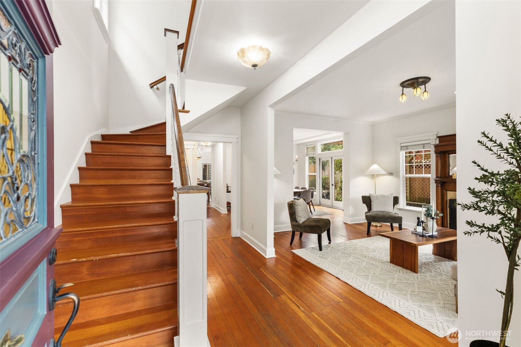 2446 Queen Anne Avenue North Seattle, WA 98109 - Photo 3 of 40 a view of entryway and hall with wooden floor