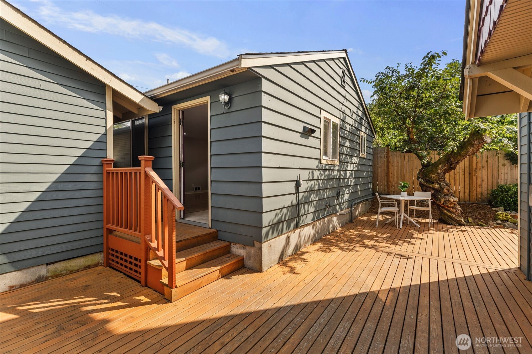 2446 Queen Anne Avenue North Seattle, WA 98109 - Photo 32 of 40 a view of outdoor space with deck and white furniture