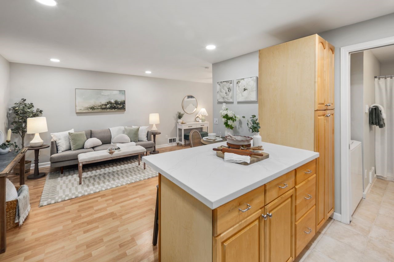 2446 Queen Anne Avenue North Seattle, WA 98109 - Photo 34 of 40 a living room with stainless steel appliances furniture and kitchen view