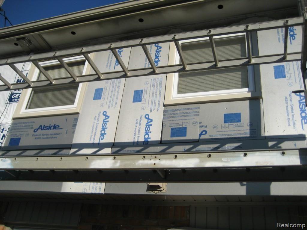 786 Ironstone Drive Rochester, MI 48309 - Photo 47 of 48 Insulation before New Siding