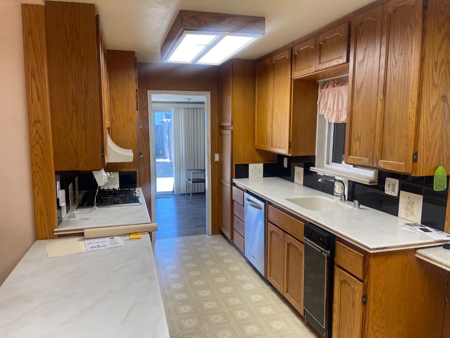 580 Cascade Drive Sunnyvale, CA 94087 - Photo 12 of 12 a large bathroom with a tub sink and mirror