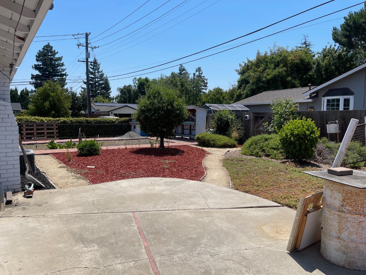 580 Cascade Drive Sunnyvale, CA 94087 - Photo 4 of 12 a view of a street with potted plants