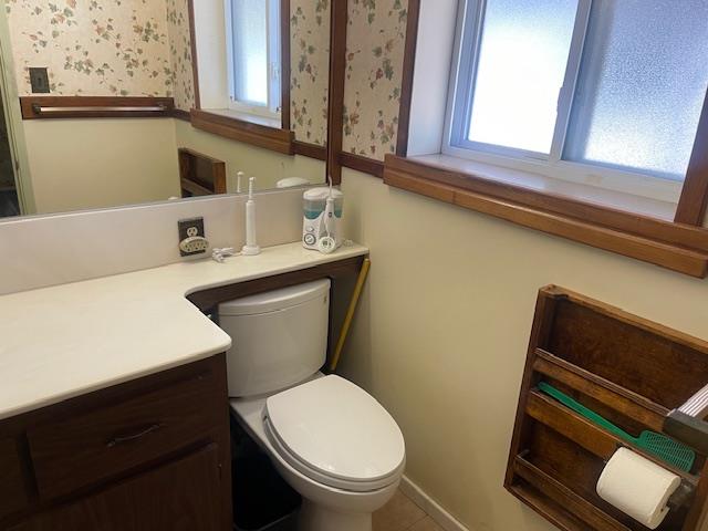580 Cascade Drive Sunnyvale, CA 94087 - Photo 7 of 12 a bathroom with a toilet a sink and a window