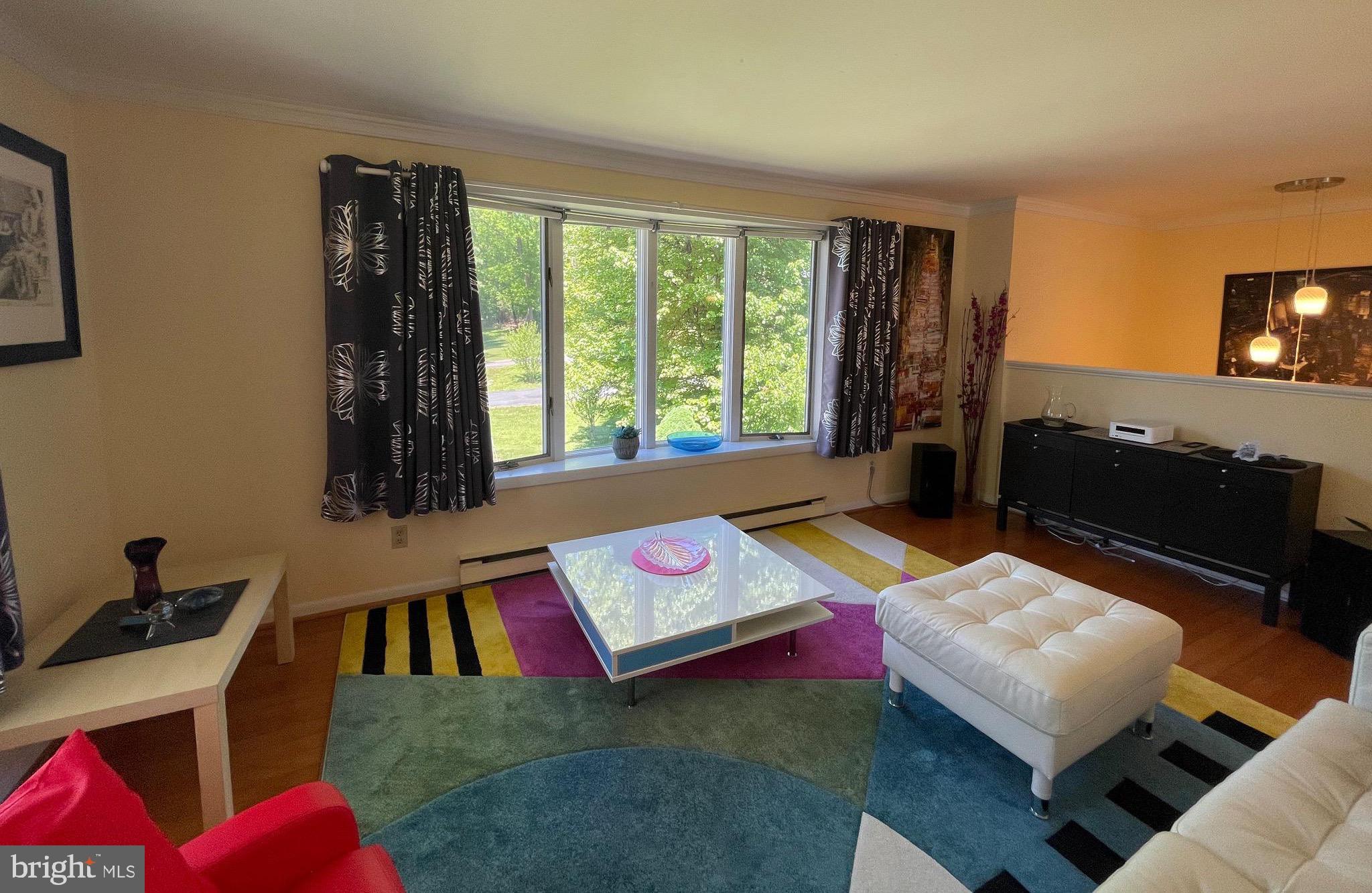 99 Exeter Court Shepherdstown, WV 25443 - Photo 17 of 51 a living room with furniture and a flat screen tv