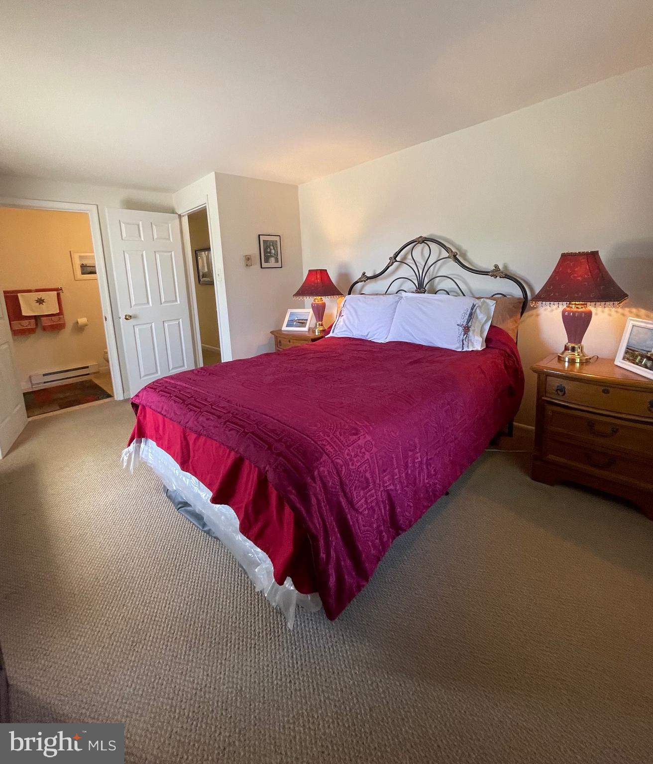 99 Exeter Court Shepherdstown, WV 25443 - Photo 22 of 51 a bedroom with a bed and dresser