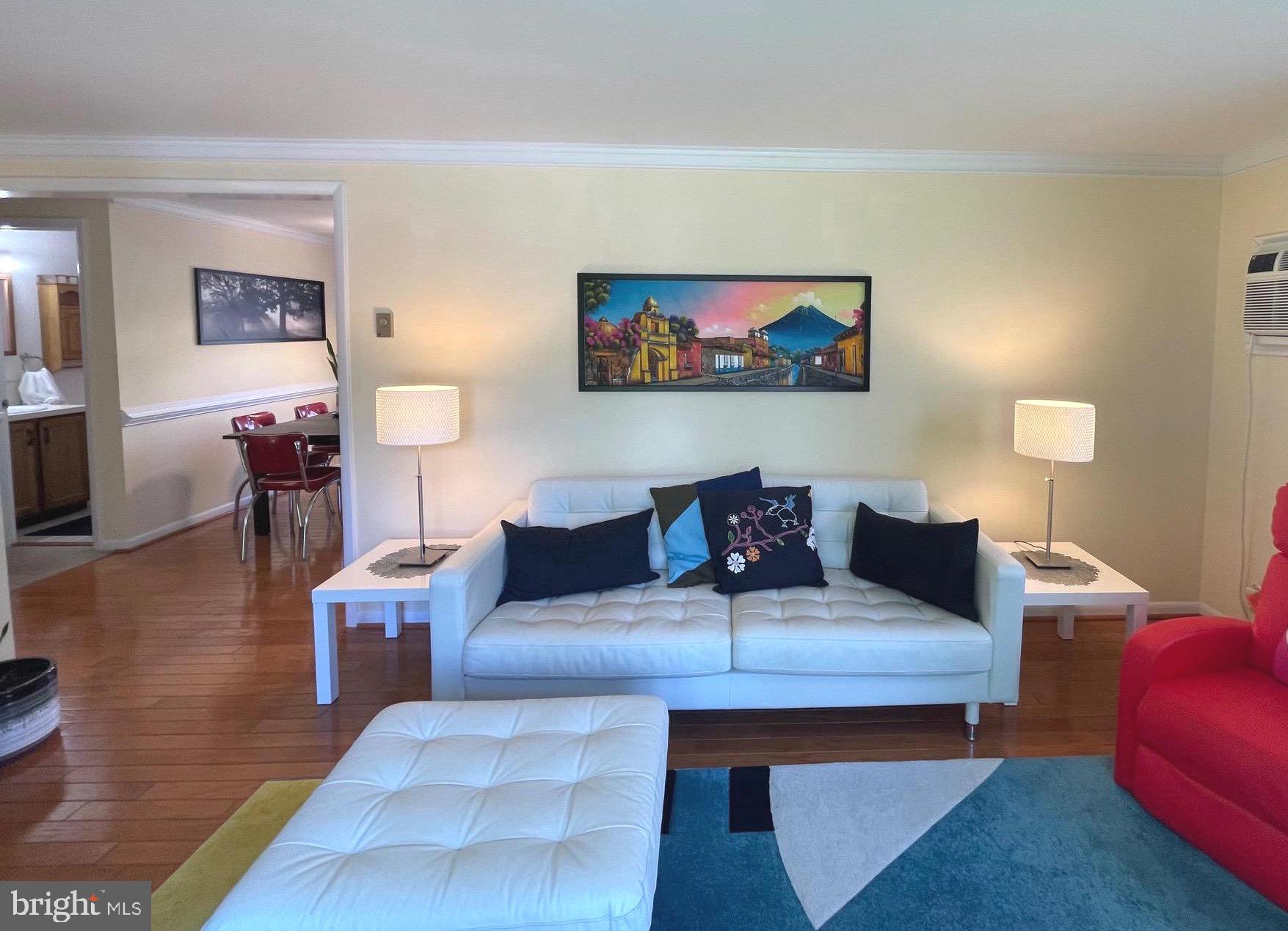 99 Exeter Court Shepherdstown, WV 25443 - Photo 3 of 51 a living room with furniture and a wooden floor