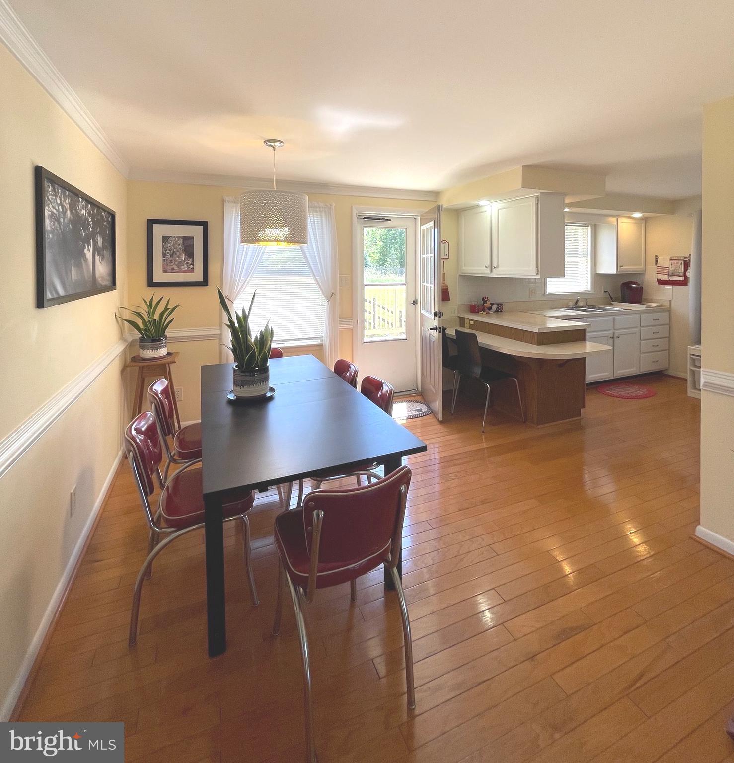 99 Exeter Court Shepherdstown, WV 25443 - Photo 6 of 51 a view of a dining room with furniture and wooden floor