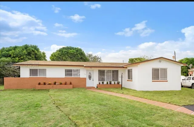 front view of house with a yard