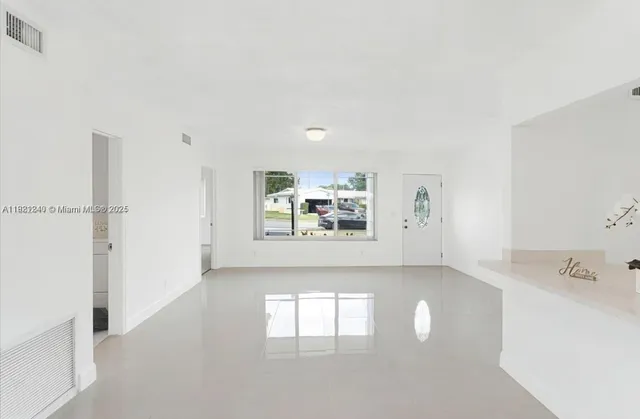 a view of a bathroom with a bathtub