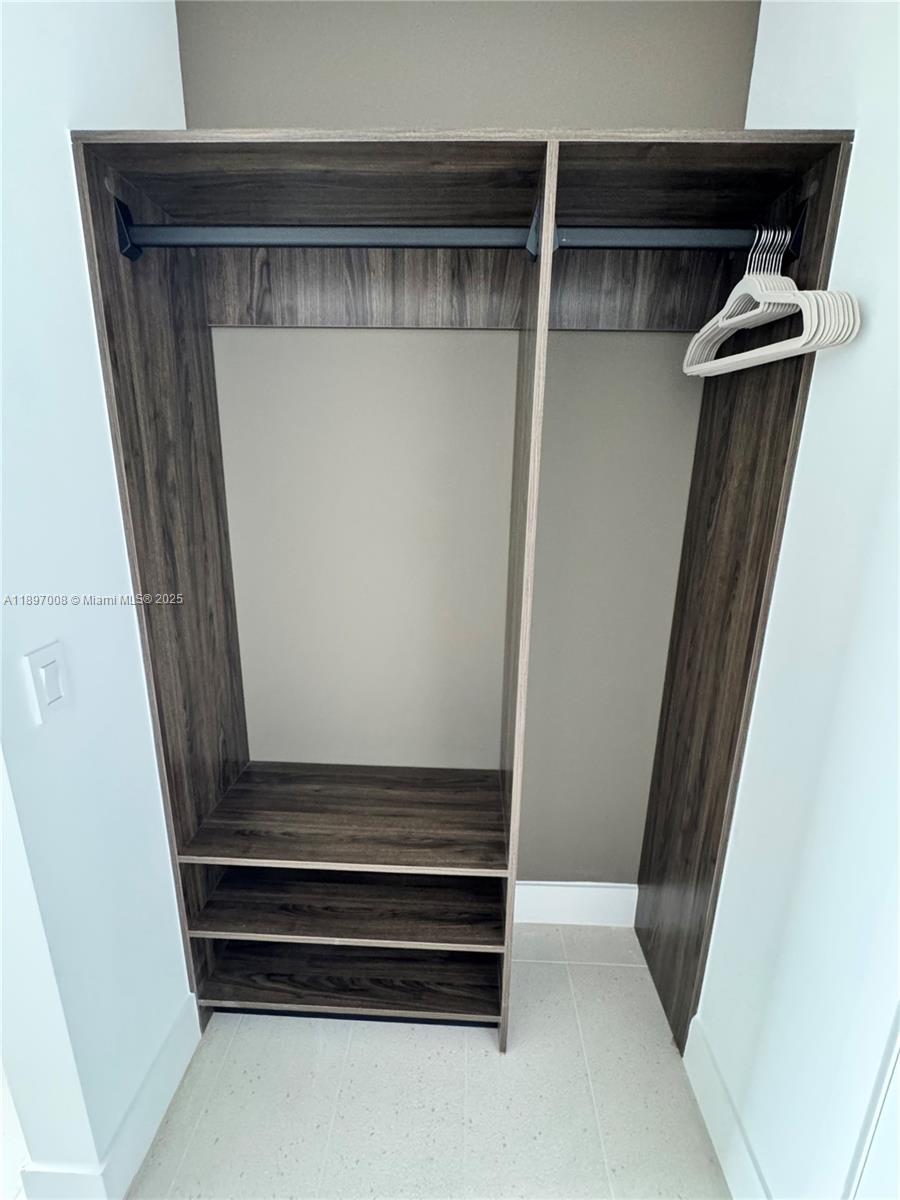 159 Northeast 6th Street, Unit 4807 Miami, FL 33132 - Photo 26 of 63 a view of walk in closet