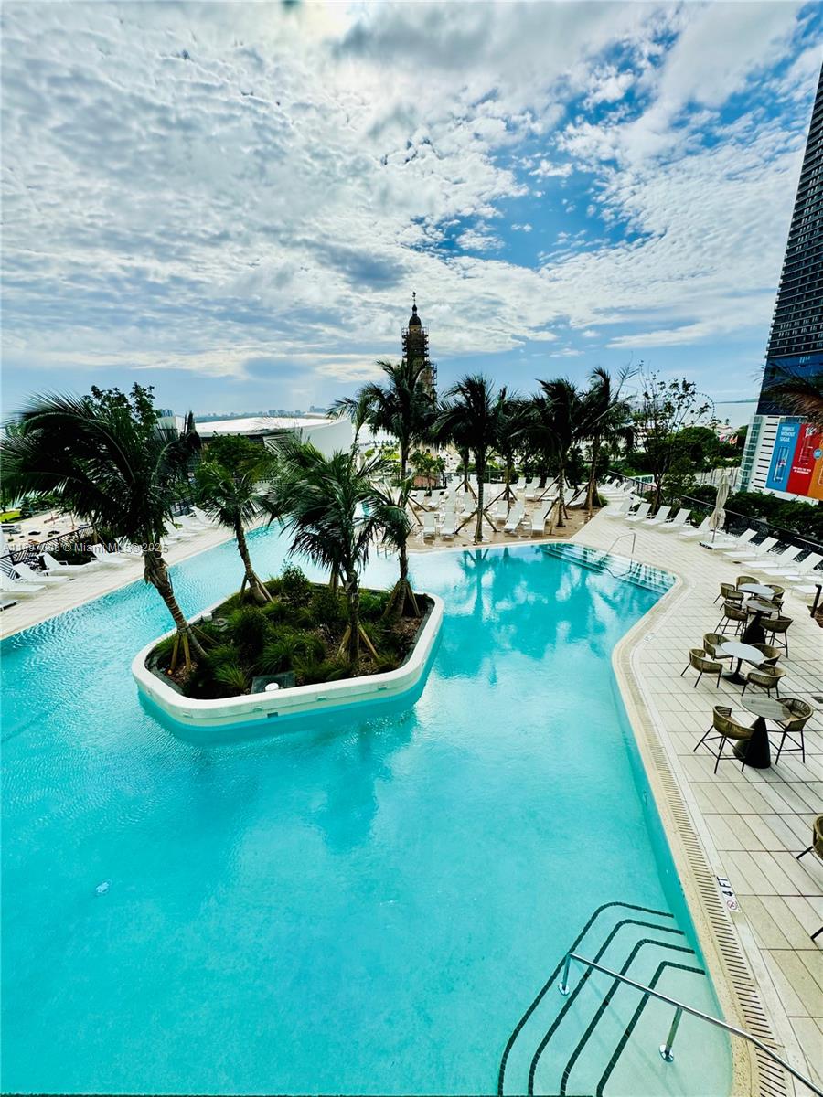 159 Northeast 6th Street, Unit 4807 Miami, FL 33132 - Photo 42 of 63 a view of a swimming pool with a yard
