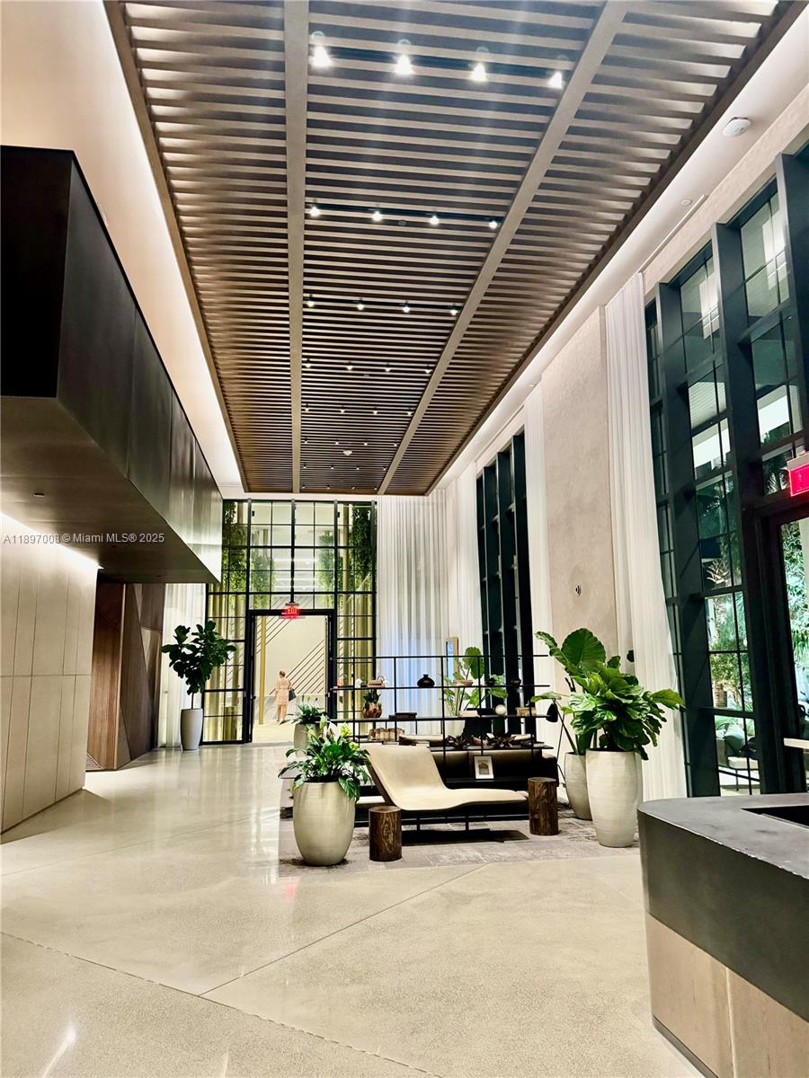 159 Northeast 6th Street, Unit 4807 Miami, FL 33132 - Photo 61 of 63 a view of a lobby with window