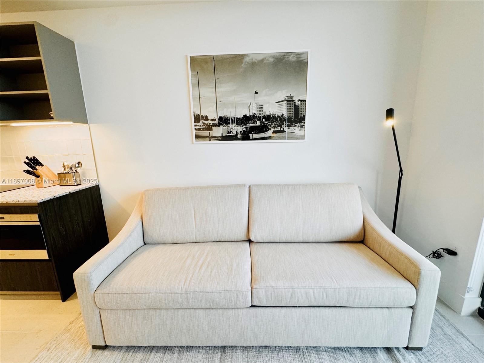 159 Northeast 6th Street, Unit 4807 Miami, FL 33132 - Photo 8 of 63 a bedroom with a bed and walk in closet