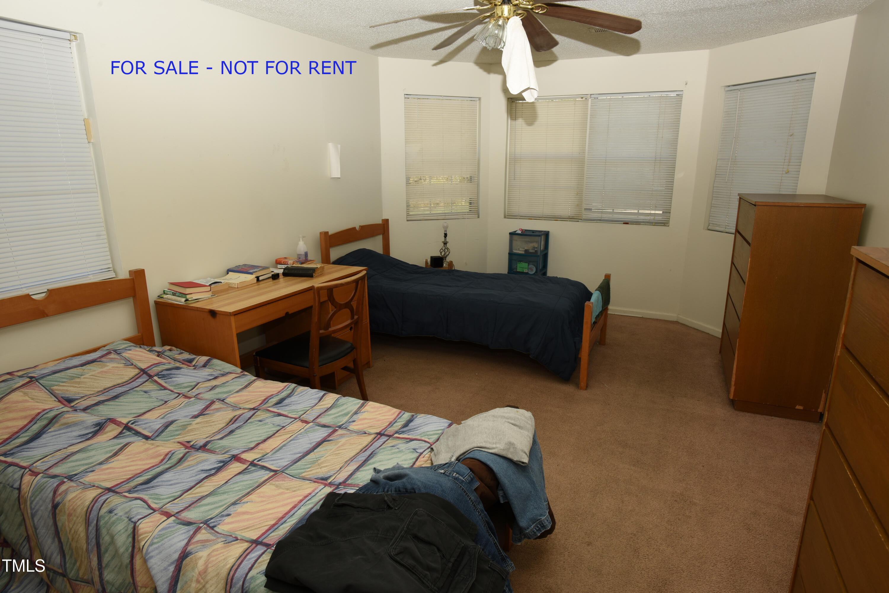 2913 Wadsworth Avenue Durham, NC 27707 - Photo 13 of 15 a bed room with a bed and a couch