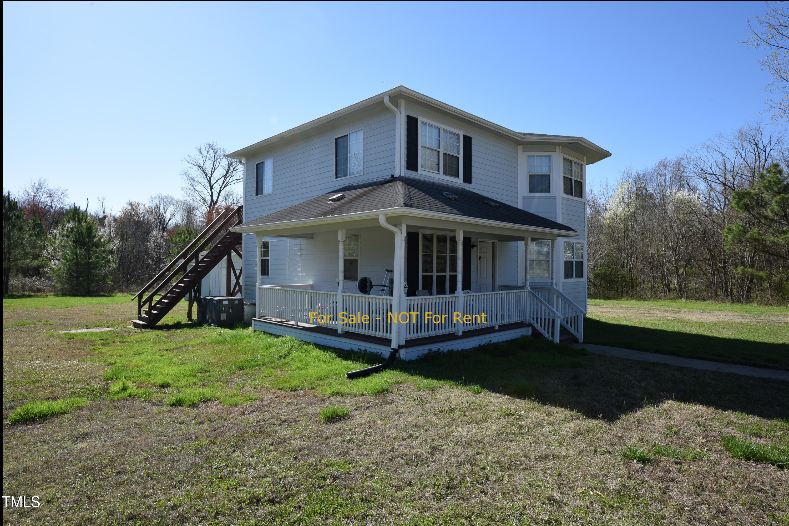 2913 Wadsworth Avenue Durham, NC 27707 - Photo 2 of 15 a front view of a house with a yard